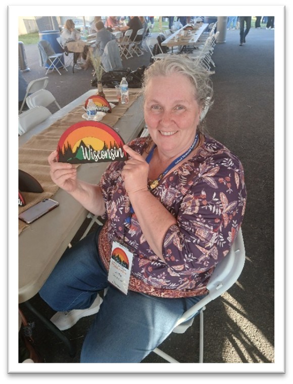 Jodie found the Wisconsin sign at the Dinner Under the Big Sky event.